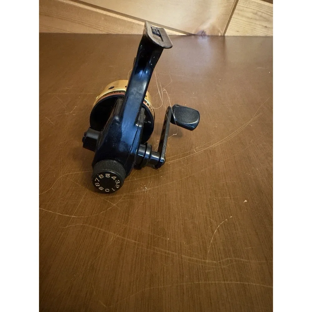 Vintage Daiwa US-80XA Spincast Fishing Reel - Gold & Black Micro Adjustable Drag